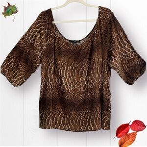 A Giannetti top size 3X brown/beige animal print elastic neckline 3/4 sleeves